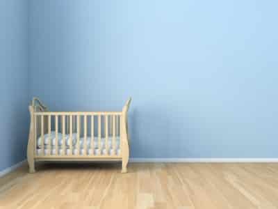 baby crib in empty room