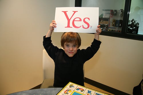 child with yes sign
