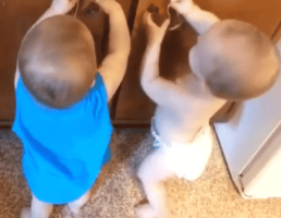 Adorable Twins Play With Rubber Bands