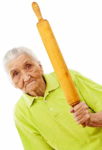 old woman with rolling pin