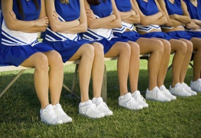 cheerleaders sitting