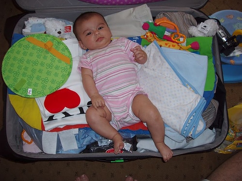 baby in suitcase