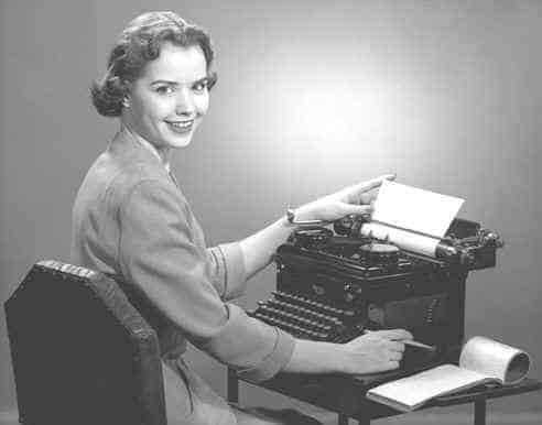 vintage woman at tyoewriter