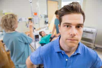 worried father in delivery room