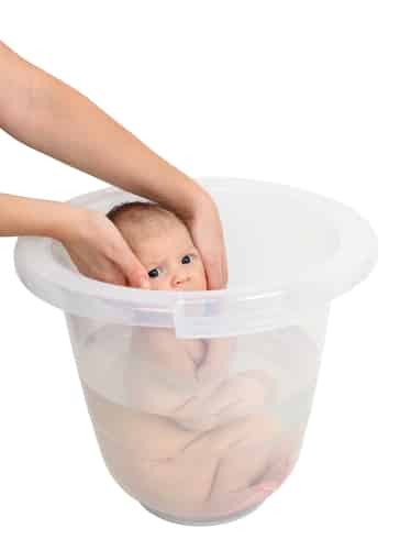 baby in plastic bucket