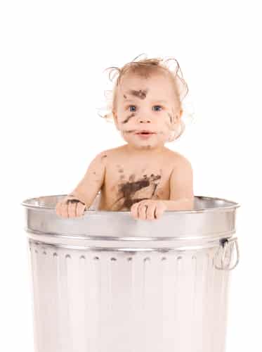 baby in trashcan