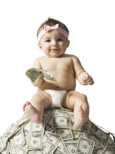 baby on a pile of money