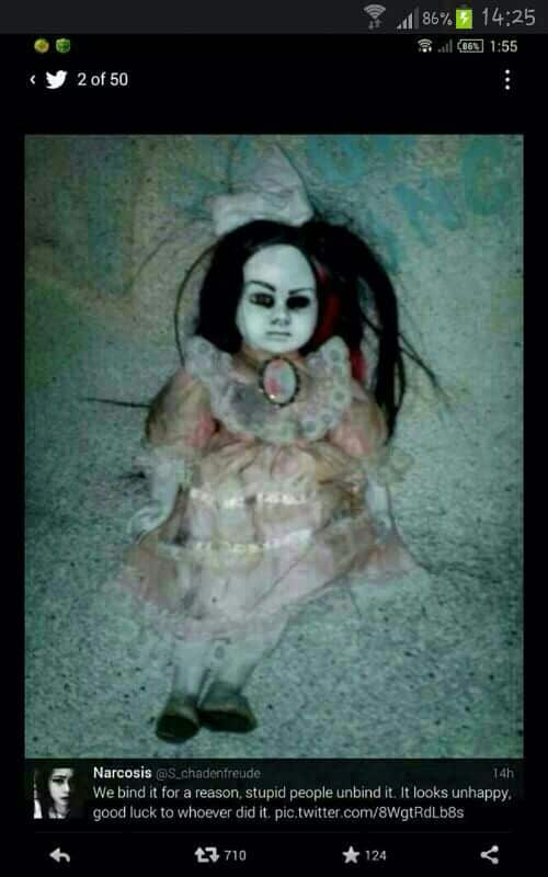 creepy cursed doll 