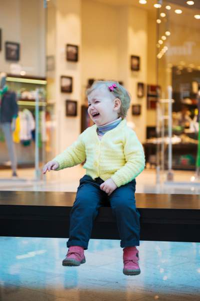 crying toddler at the mall