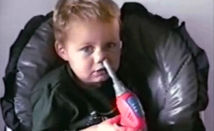 kid with drill in nose