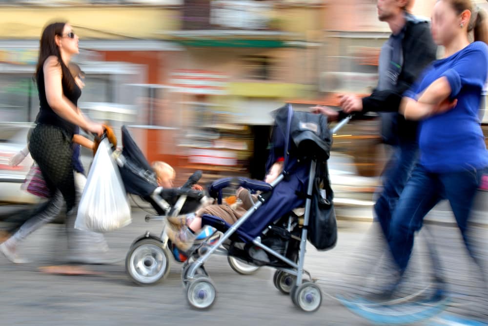 pushing-child-in-stroller
