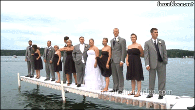 bridal-party-falls-in-lake