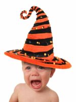 crying baby in halloween hat