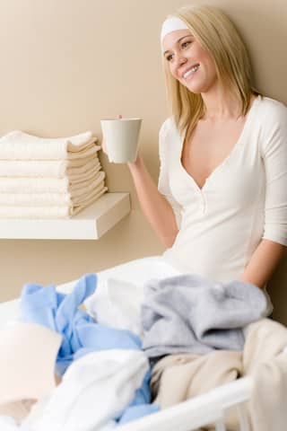 http://www.dreamstime.com/royalty-free-stock-images-laundry-ironing-woman-break-drink-image18595309