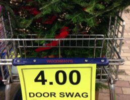 christmas wreath woodman's door swag cart