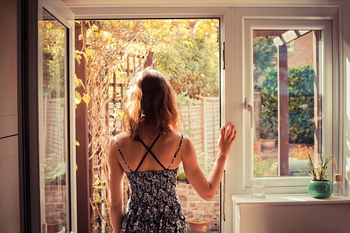 woman-looking-out-window