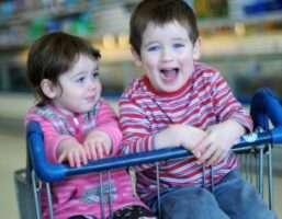 children in grocery cart