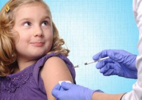 little girl getting vaccinated