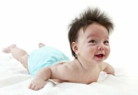 smiling-baby-wearing-cloth-diaper
