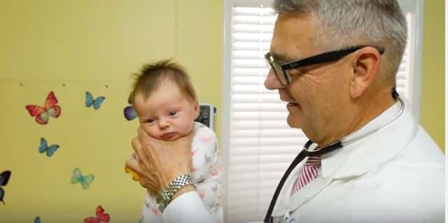 doctor-calms-baby-newborn-hold-video