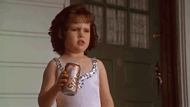 girl angry crushing soda can