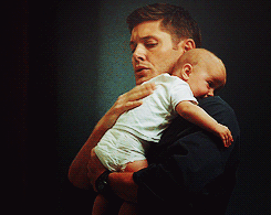Supernatural Dean Winchester holds baby 
